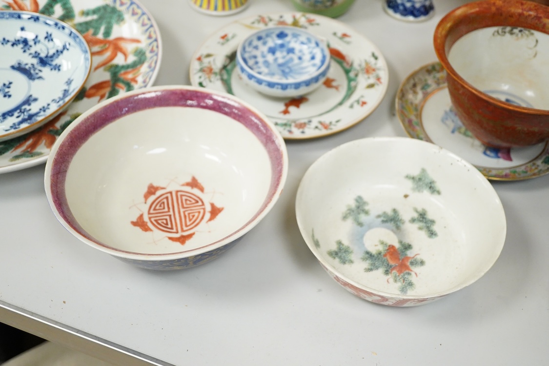 A collection of Chinese ceramics, 18th century and later to include a blue and white vase and cover, ‘goldfish’ charger and various bowls, largest 36cm in diameter